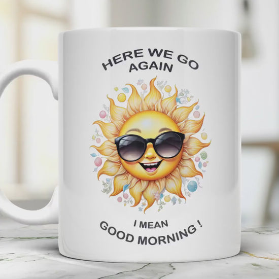 Funny sunshine 11 oz ceramic coffee mug with “Here We Go Again” text design