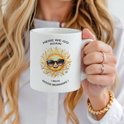 Funny sunshine 11 oz ceramic coffee mug with “Here We Go Again” text design